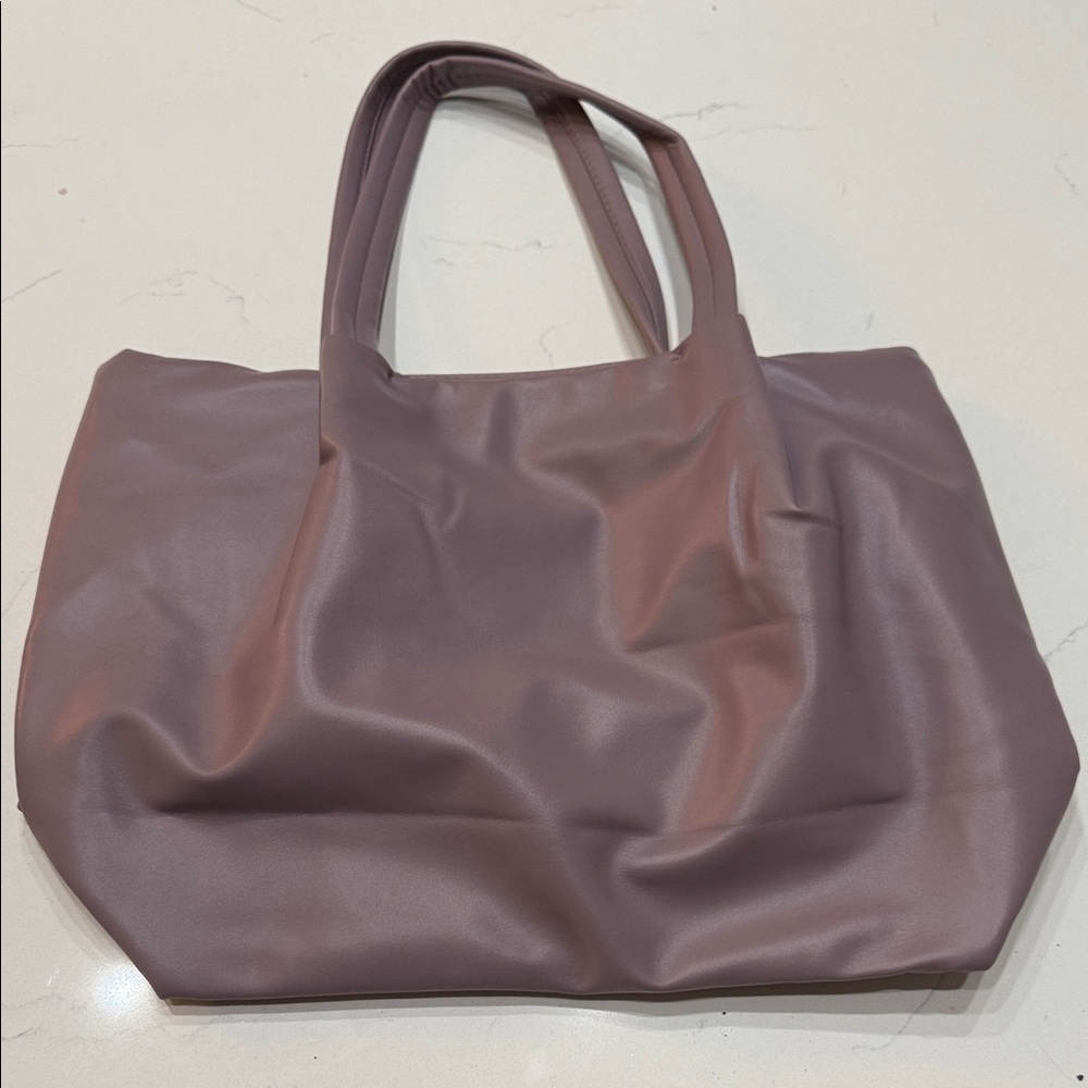 Elegant lavender Neiman Marcus tote bag with magnetic closure. Never used